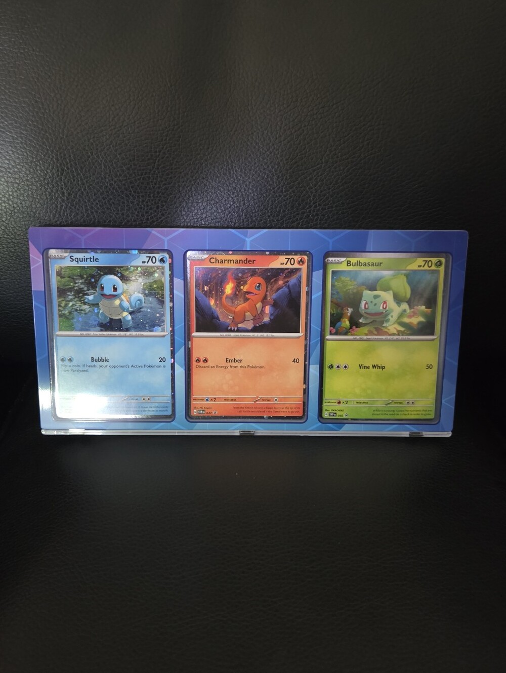 Pokémon Squirtle Charmander Bulbasaur Promo Trading Cards Trio in Blue Display